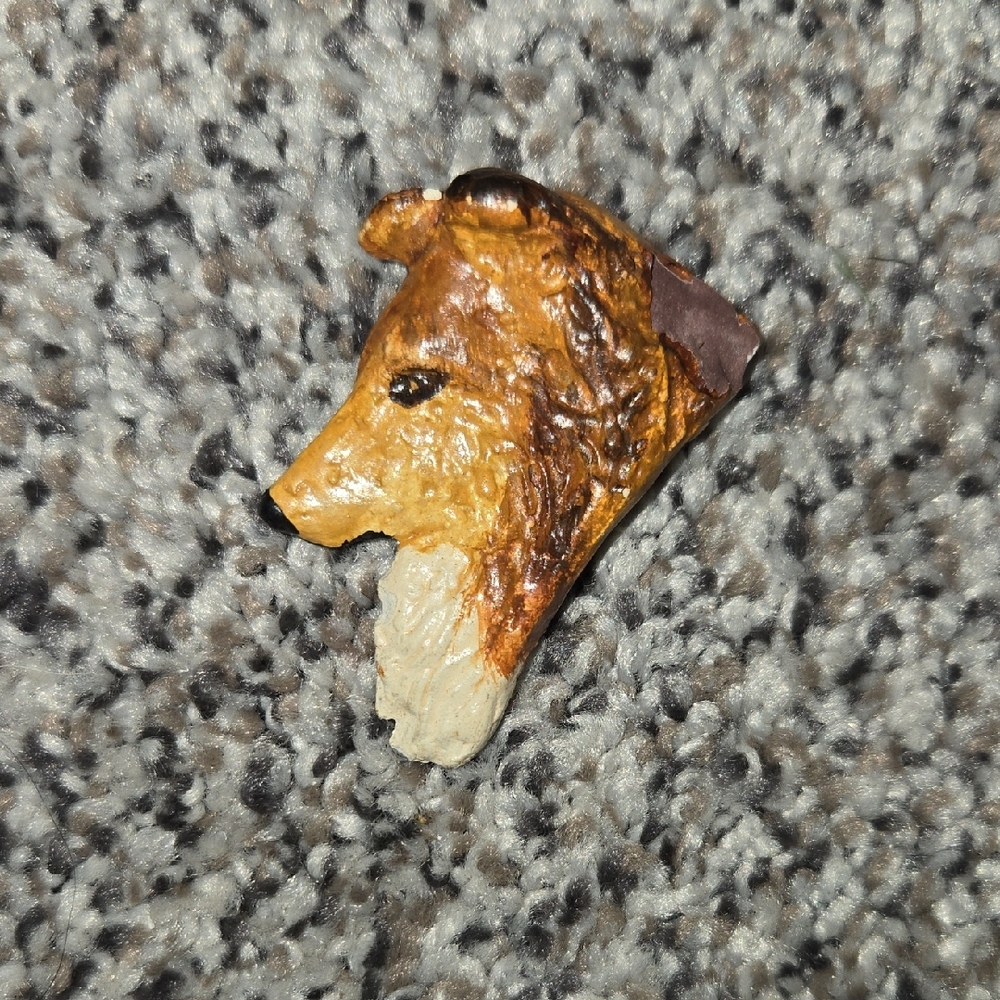 Brown and Tan Dog Figurine